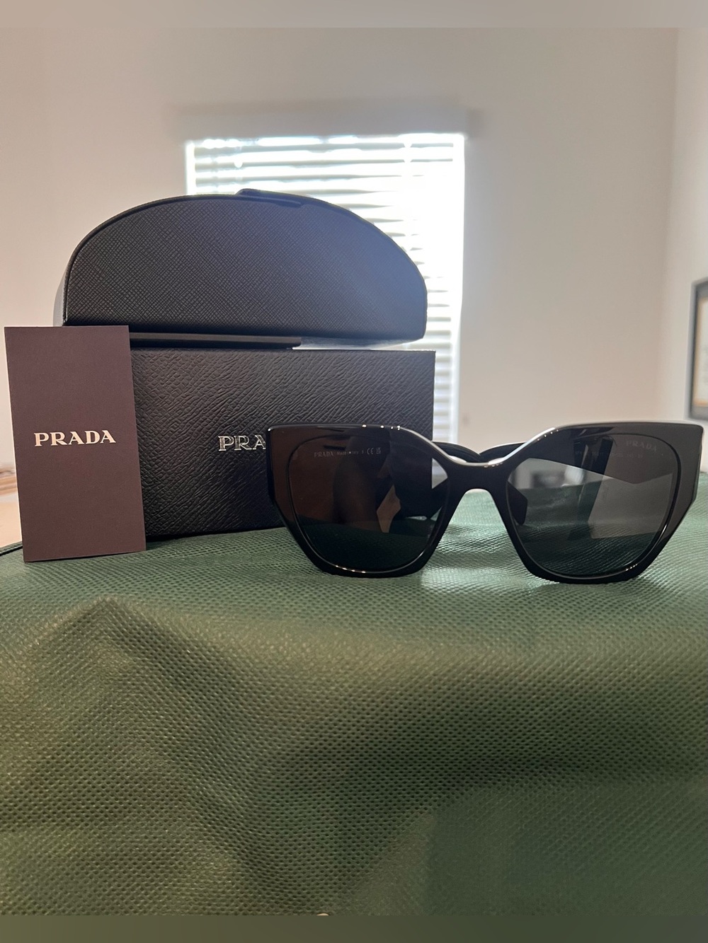 Prada Black Oversized Cat-Eye Sunglasses with Dark Lenses